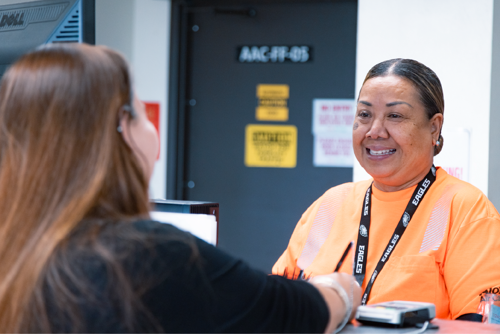 Aloha Air Cargo employee operating a forklift. Aloha Air Cargo employee operating a forklift.
