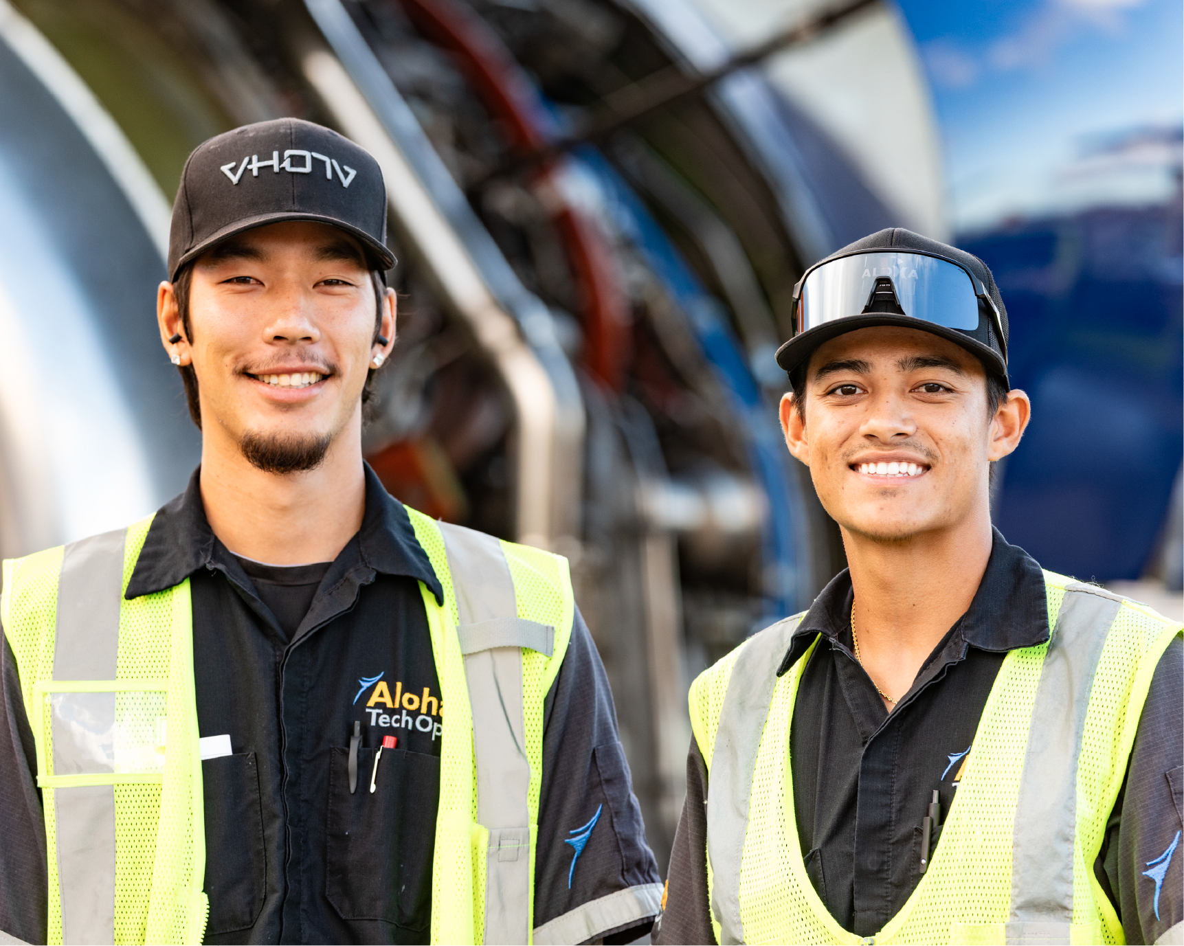 Photo of a maintenance employee looking at the plane. 